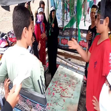 شعر خوانی و دکلمه سرایی در مزار شهید گمنام توسط اعضای کودک کتابخانه شهدای الاشت(1401